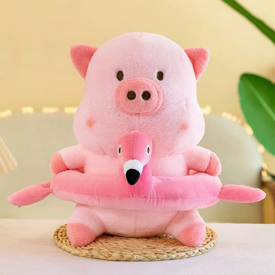 Pink plush toy with pig and flamingo design