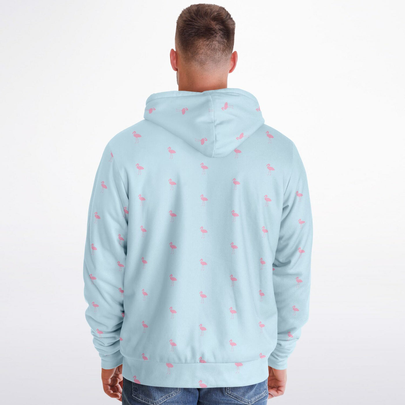 Light blue hoodie with small pink patterns on the back, worn by a person on a white background