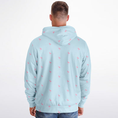 Light blue hoodie with small pink patterns on the back, worn by a person on a white background