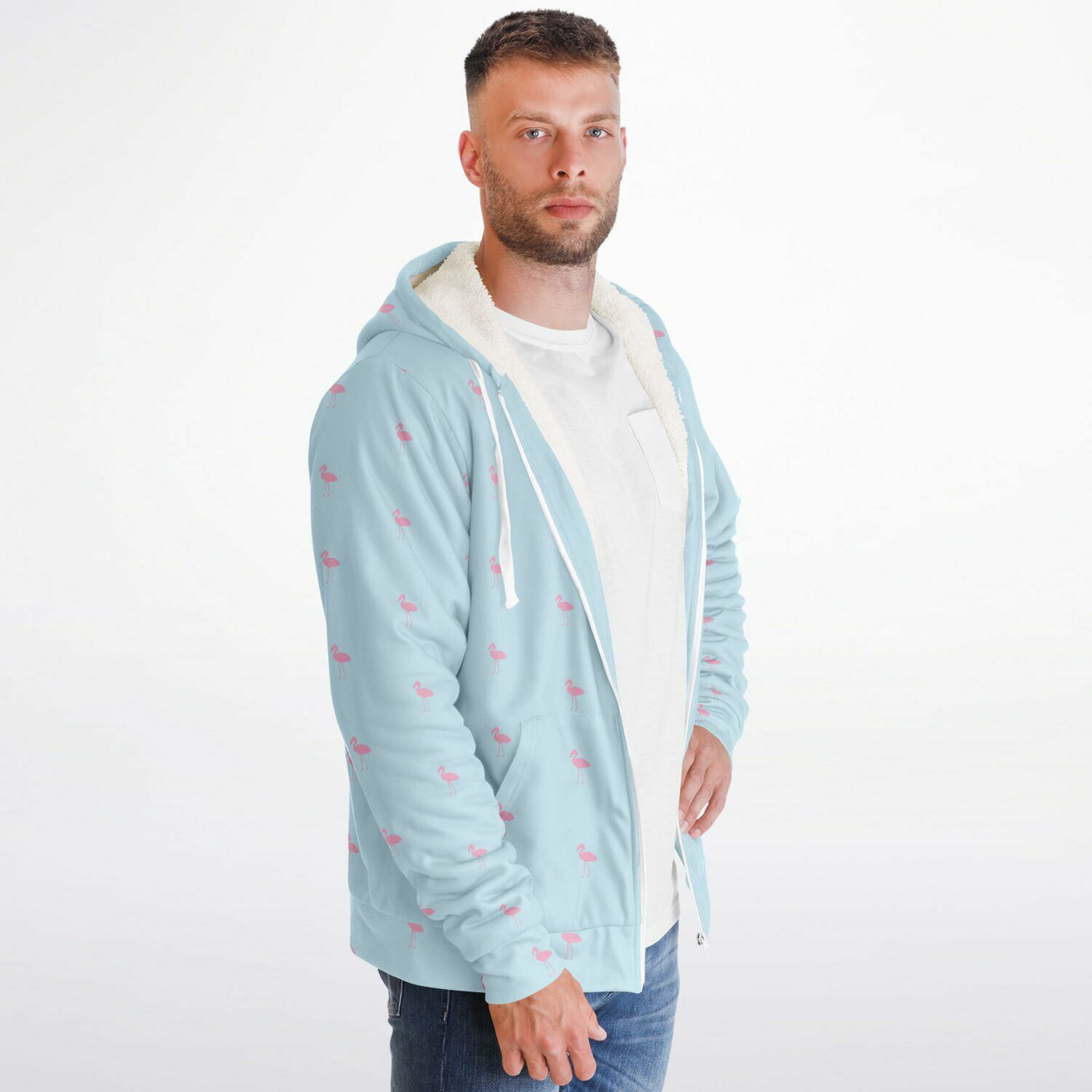 Man wearing a light blue hoodie with small red hearts on a white background