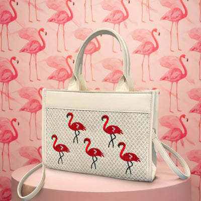 Handbag with flamingo design on a pink background with flamingo pattern