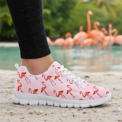 Pink flamingo-patterned sneaker on a blurred background with flamingos