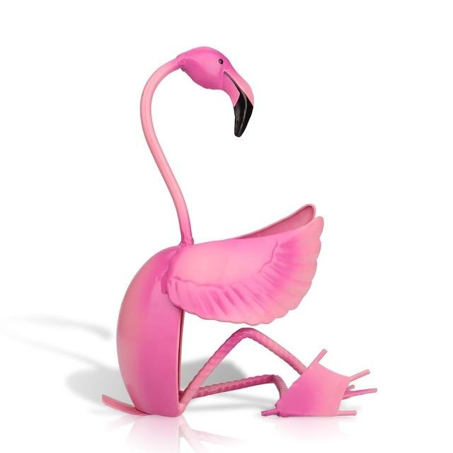 pink flamingo sitting wine holder 